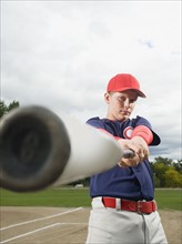 Baseball player swinging bat. Date : 2008