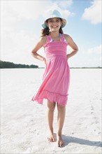 Girl walking on beach. Date : 2008