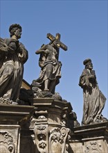 Statue of Saint Kosma, Saint Damian, and Christ in Prague.