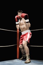 Boxer standing in fighting stance in boxing ring. Date : 2008