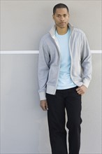 Portrait of young man leaning against wall. Date : 2008