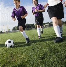 Boys playing competitive soccer. Date: 2008