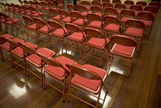 Fold up chairs in rows. Date : 2008