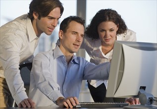 Business people working at computer.
