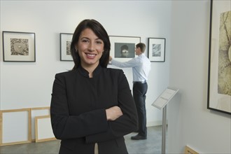 Portrait of curator in art gallery.