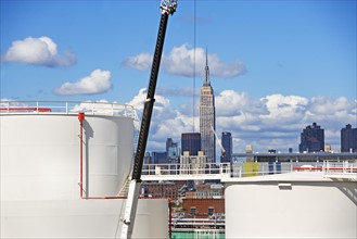 Oil storage tanks with New York City in background. Date : 2008