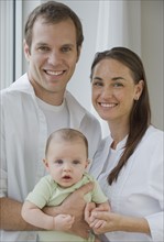 Portrait of couple and baby son.