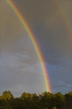 Rainbow and storm clouds, Grand Canyon, Arizona.