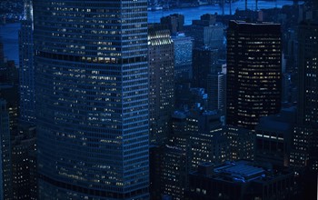 Highrise buildings in New York City at sunset.