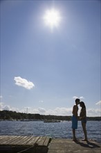 Couple kissing on dock. Date : 2008