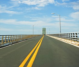 Road with bridge in distance. Date: 2008