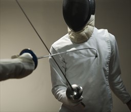 Two men fencing. Date: 2008