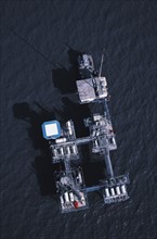 Aerial view of oil rig platform in the Gulf of Mexico. Date: 2008