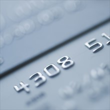 Close up of numbers on credit card.