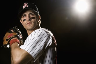 Portrait of pitcher preparing to throw ball. Date : 2008