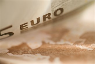 Close up of five euro bill.