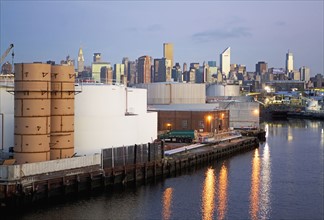 Oil storage tanks with New York City in background. Date : 2008
