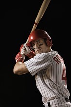 Portrait of baseball player in batting stance. Date: 2008