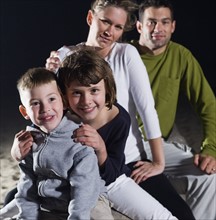 Portrait of family on beach. Date : 2008