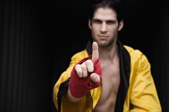 Portrait of boxer with finger extended. Date : 2008