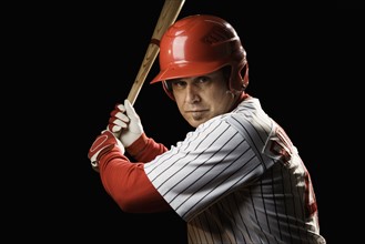 Portrait of batter holding baseball bat. Date : 2008