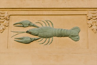 Lobster carving to identify house, Prague.