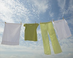 Clothes hanging from clothesline.