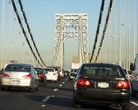 Cars moving across George Washington Bridge, New York. Date: 2008