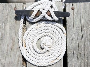 Coiled rope and nautical knot. Date: 2008
