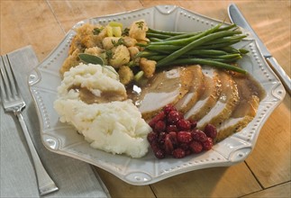Thanksgiving dinner on plate.