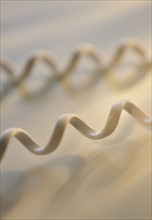 Close up of telephone cord.