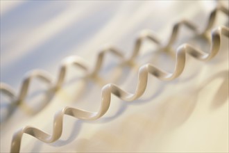 Close up of telephone cord.