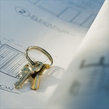 Keys on blueprints. Photographe : Daniel Grill
