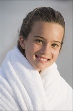 Portrait of girl wrapped in a towel. Photographe : mark edward atkinson