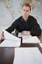 Businessman reviewing documents.