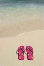 Sandals on beach.