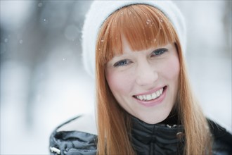 Portrait of woman in snow.