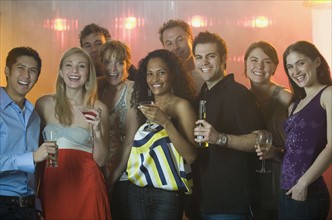 People drinking in nightclub.