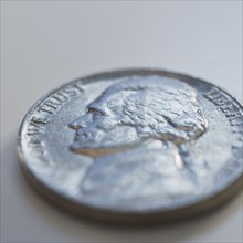 Close up of silver coin.