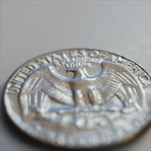 Close up of silver coin.