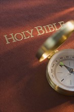 Compass and Holy Bible.
