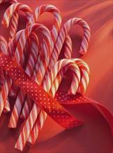 Candy canes and ribbon.