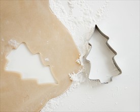 Christmas cookie cutter and dough. Photographe : Jamie Grill