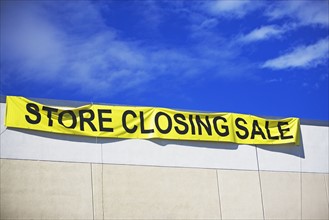 Store closing sign. Photographe : fotog