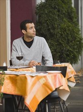 Man waiting for date in restaurant.