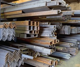 Stacks of raw steel in warehouse. Photographe : fotog