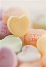 Close up of candy hearts.