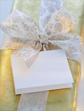 Gift with ribbon and card.