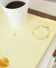 Coffee stain on notebook. Photographe : Jamie Grill