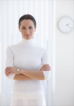 Portrait of business woman in modern interior.